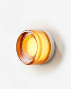Wall Lamp - EVO, amber-tinted glass dome on a white aluminium base