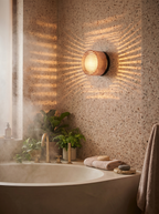 Wall Lamp - ILA, copper-toned ribbed glass dome on a matte black aluminium base, view 3